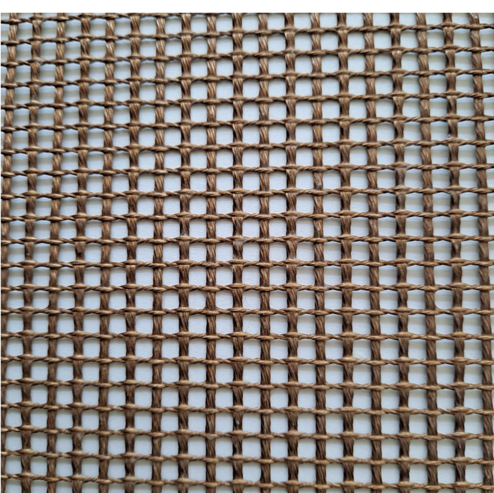 Close view of brown coated mesh yarns and openings