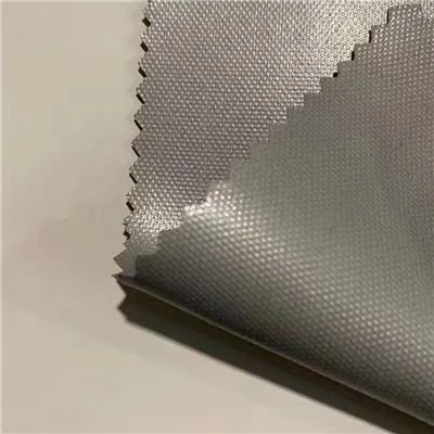 Close view of gray coated fabric and its woven edge